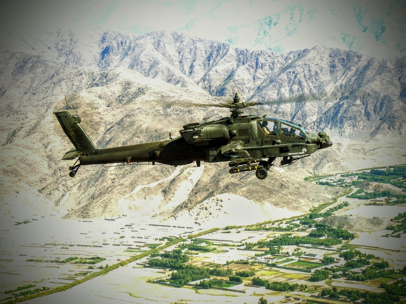 Illustration for article titled One Of Our Readers Is Flying Apaches In Afghanistan And Really Knows How To Use A Camera